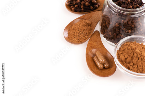 Dried clove flowers isolated on a white background. photo