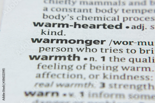 Word or phrase Warmonger in a dictionary. photo