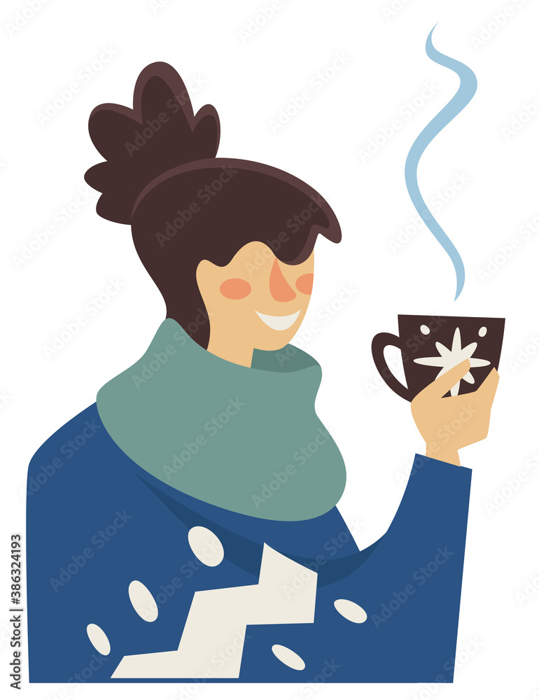 Woman drinking hot coffee or tea in winter