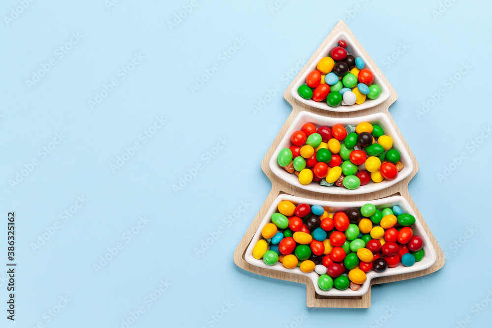 Christmas greeting card with fir tree shaped sweets