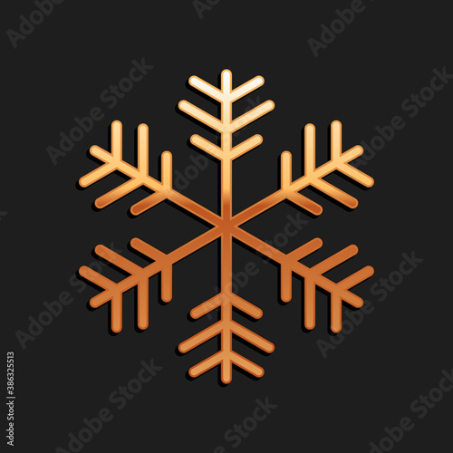 Gold Snowflake icon isolated on black background. Long shadow style. Vector.