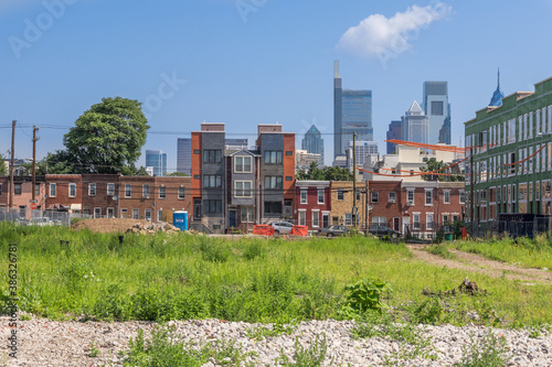 A work in progress - Gentrification in a south Philadelphia neighborhood with downtown skyline.