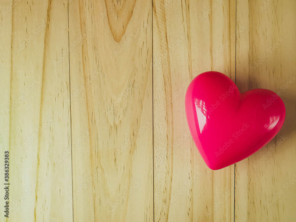 pink heart on wood table for Health and medical content.. pink heart on wood table for Health and medical content..