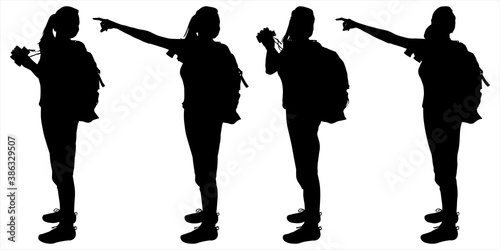 A girl with a large tourist backpack behind her back and binoculars in her hands. The woman points with her hand the way, the direction. Four female silhouettes in black isolated on white background.