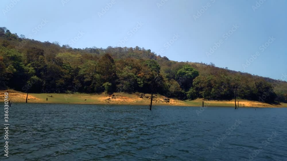 Sailing Past Wild Forest Of Island At River Thekkady Kerala 4K Sailing Past Wild Forest Of Island At River Thekkady Kerala 4K