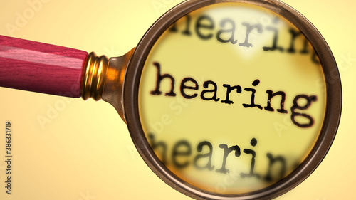 Examine and study hearing, showed as a magnify glass and word hearing to symbolize process of analyzing, exploring, learning and taking a closer look at hearing, 3d illustration