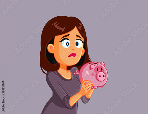 Unhappy Broke Woman Holding Piggy Bank