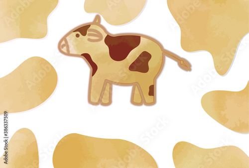クッキー風の牛とホルスタイン柄の背景の年賀状イラスト