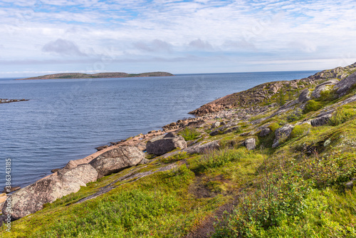 Rocky coast of the German Kuzov island. photo