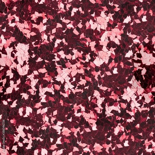 Dark red glitter, sparkle confetti texture. Christmas abstract background, seamless pattern.