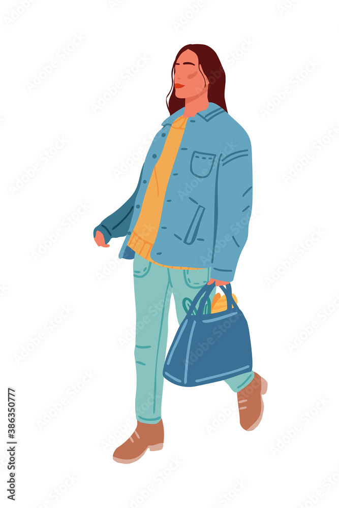 Modern woman goes with shopping grocery bag Modern woman goes with shopping grocery bag