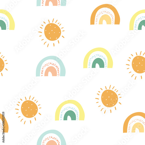 Seamless childish pattern with hand-drawn rainbow and sun vector illustration. Good for kids theme, textile, fabric, stationary, wrapping wrap, card.