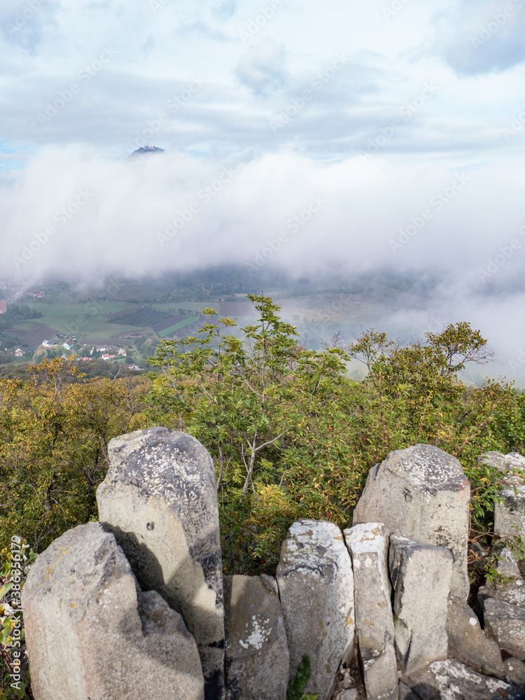 milesovka mountain seen from ostry above morning fog - obrazy, fototapety, plakaty 