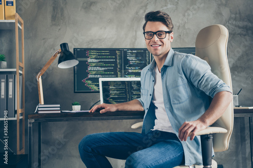 Valokuva Portrait of positive guy it specialist sit chair desk enjoy working pc home read