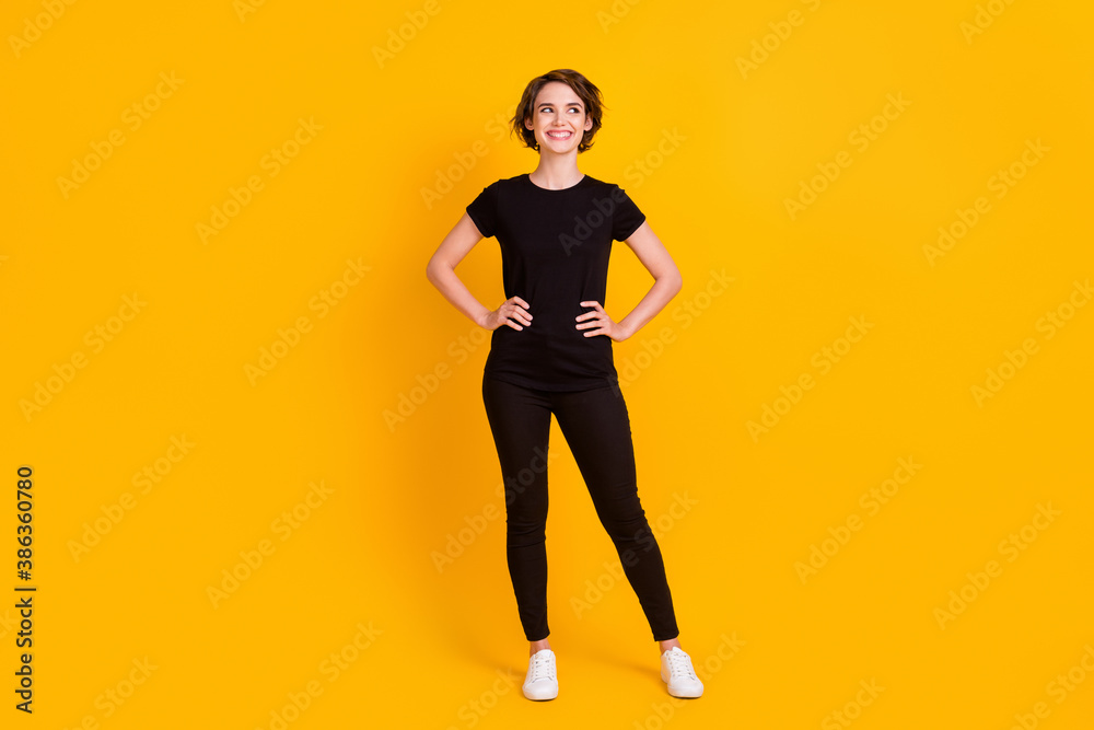 Full length body size view of skinny creative curious cheerful girl looking aside copy space think isolated bright yellow color background