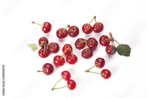 Image cherries on a white background. Cherries with drops isolated on white background