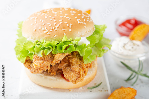 Chicken burger on a light background