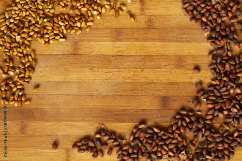 cedar nut on wooden background