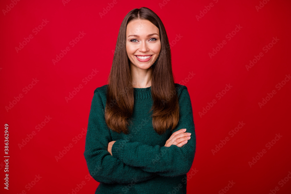 Fototapeta premium Photo of charming girl cross hands toothy smile in camera isolated over vivid red color background