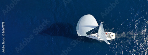 Fotografia Aerial drone ultra wide panoramic photo of beautiful sailboat with white sails c