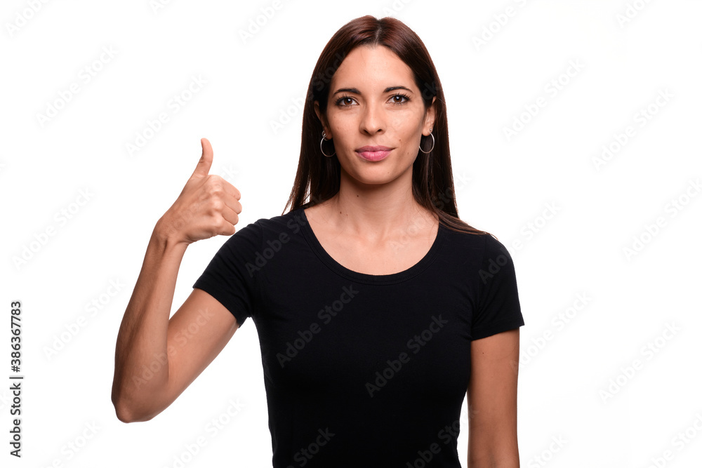 Isolated in white background brunette woman saying letter A in spanish sign language Isolated in white background brunette woman saying letter A in spanish sign language