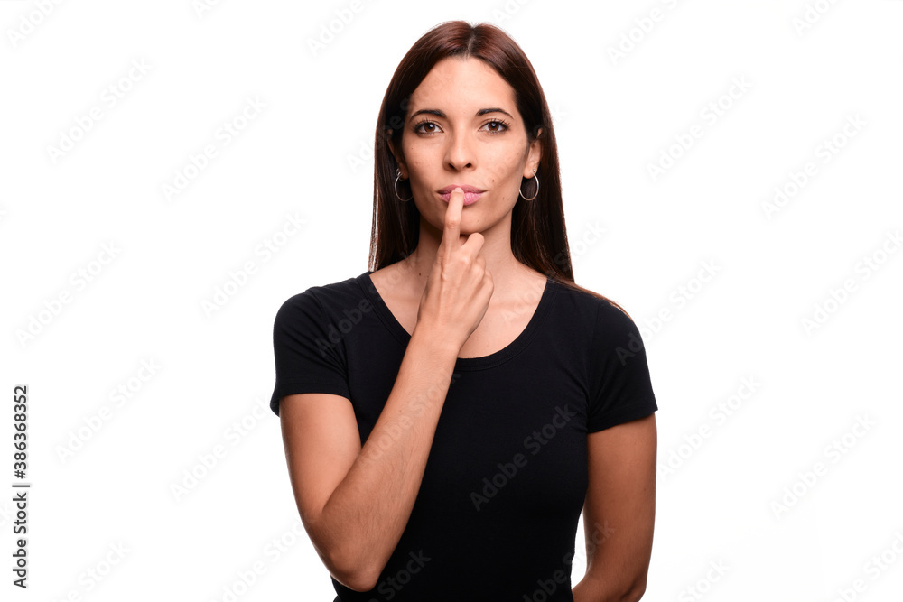 Isolated in white background brunette woman saying red in spanish sign language Isolated in white background brunette woman saying red in spanish sign language