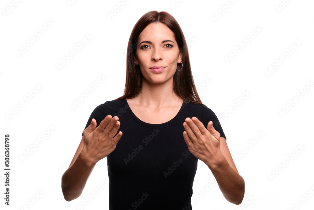Isolated in white background brunette woman saying thank you in spanish sign language Isolated in white background brunette woman saying thank you in spanish sign language