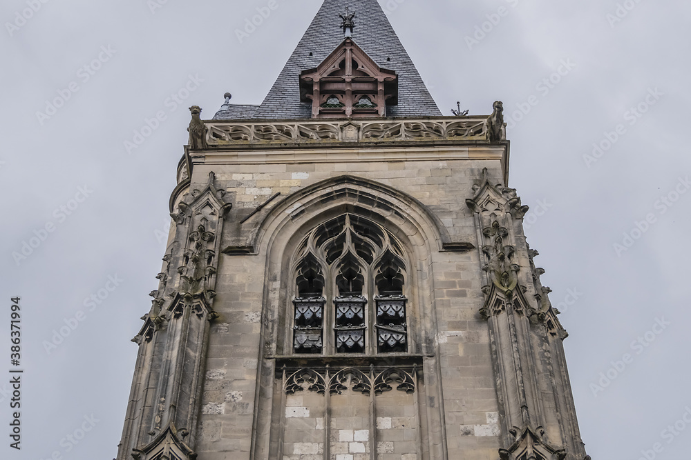 Fototapeta premium Fragment of Amiens Church of Saint-Leu, dedicated to Bishop of Sens - Saint Leu. Built in 1481, church of Saint Leu is one of the twelve ancient Amiens parishes. Amiens, Somme, Picardie, France.