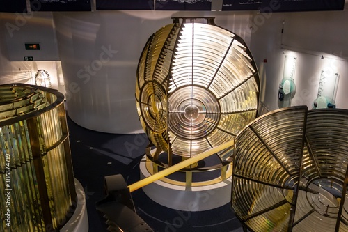 Double flash 1st order lighthouse lens resembling C-3PO robot and other nautical equipment at historical museum at Fraserburgh, Scotland, UK