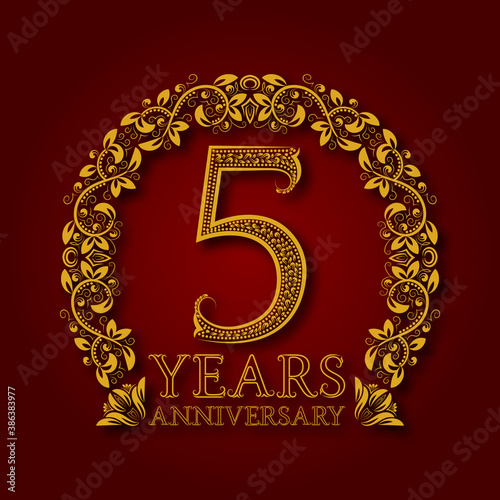 Golden emblem of fifth years anniversary. Celebration patterned logotype with shadow on red.