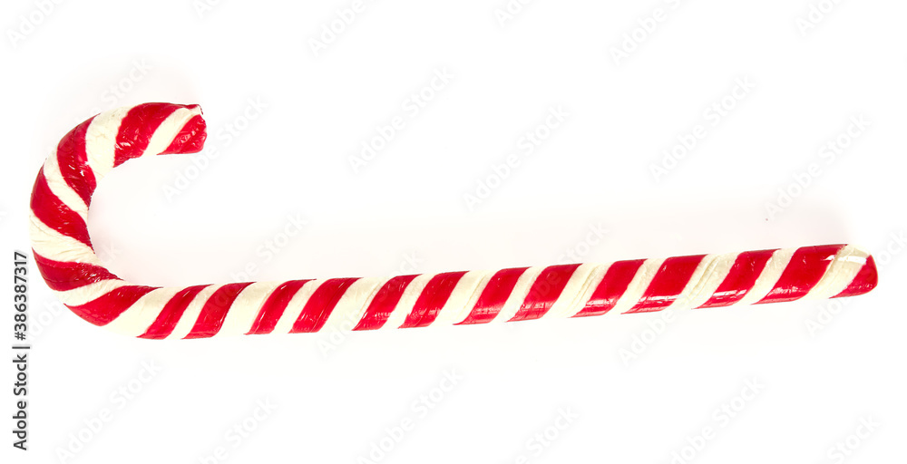 Fototapeta premium Striped Christmas candy cane isolated on white