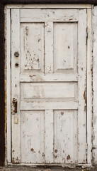 Canvas schilderij Oude deur Ruwe deur met witte verweerde verf  © Blacksmith Graphics