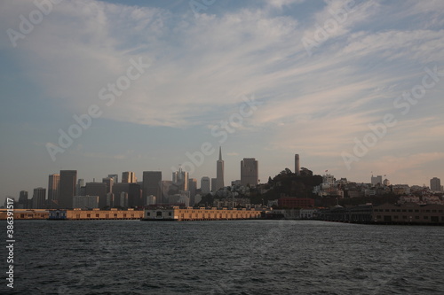 View of San Francisco skyline from Alcatraz Island under sunset in San Francisco, California, USA.