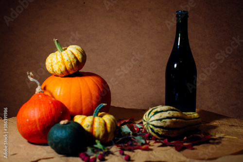 Bright pumpkins on the table on craft paper
