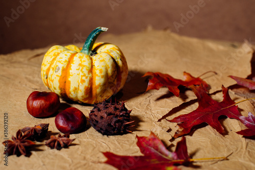 Bright pumpkins on the table on craft paper