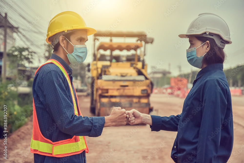 Close up engineer shake hand on site construction Close up engineer shake hand on site construction