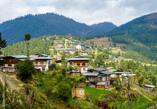 Bhoutan, a typical house in the countryside	 photo