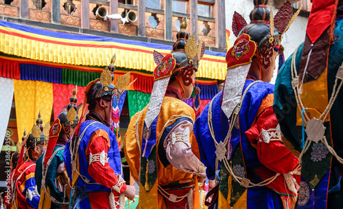 Bhutan, in the village of Bumthang, dancers in colourful costumes danse and play on drums on the yearly festival of Jakar 