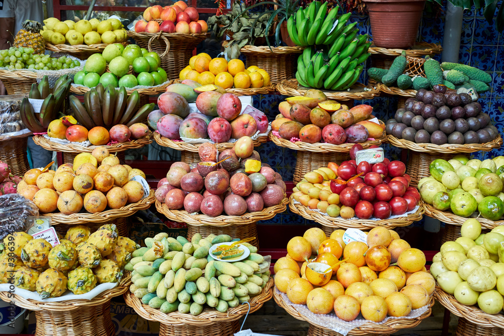 Fresh exotic fruits in Mercado Dos Lavradores traditional market. Funchal, Madeira island, Portugal