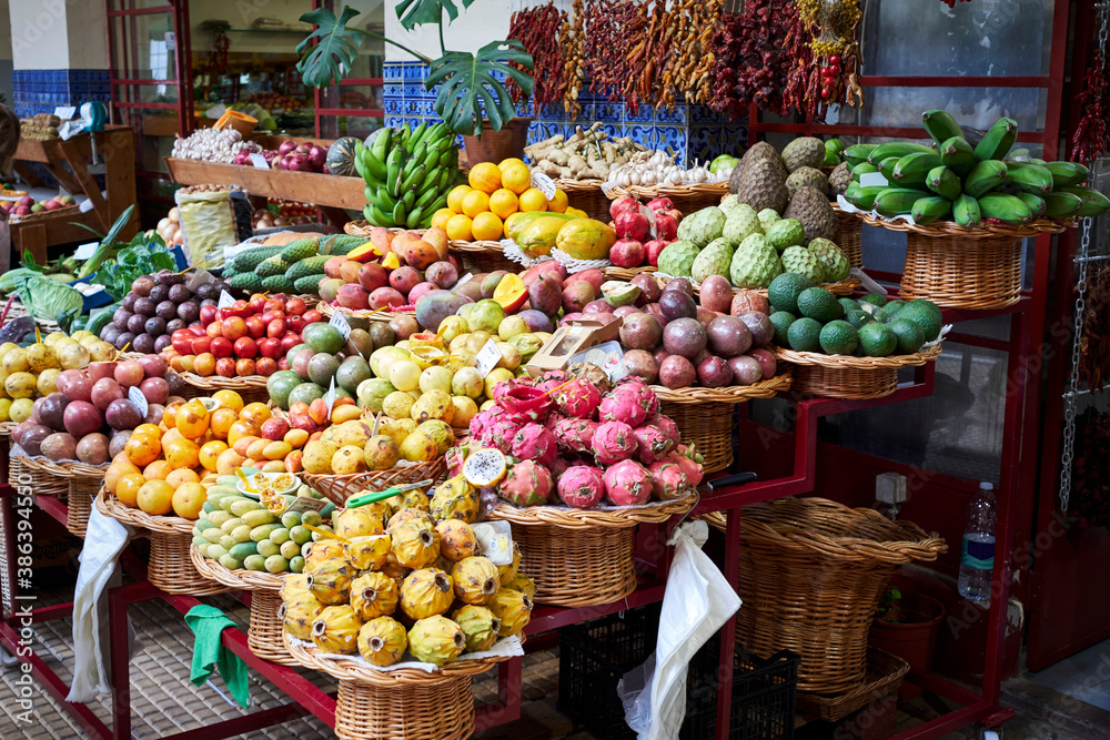 Fresh exotic fruits and spices in Mercado Dos Lavradores traditional market. Funchal, Madeira island, Portugal
