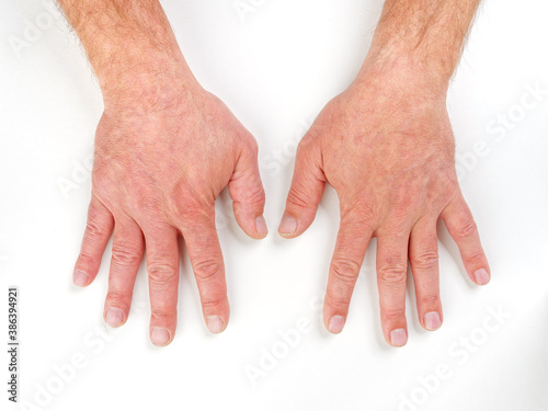 male hands palm brushes on white background