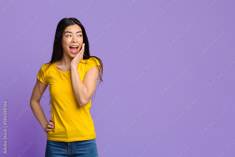 Wow. Amazed Korean Woman Looking Aside At Copy Space, Exclaiming With Excitement Wow. Amazed Korean Woman Looking Aside At Copy Space, Exclaiming With Excitement