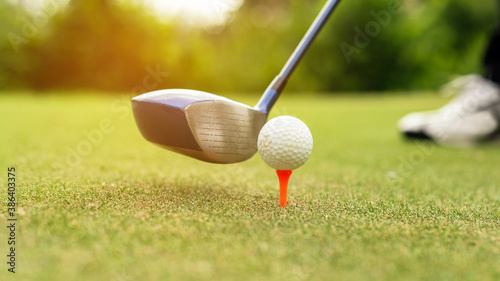 Wallpaper Mural Close up Golf club hitting golf ball along fairway towards green with copy space, green nature background. Lifestyle and Healthy Concept. . Torontodigital.ca