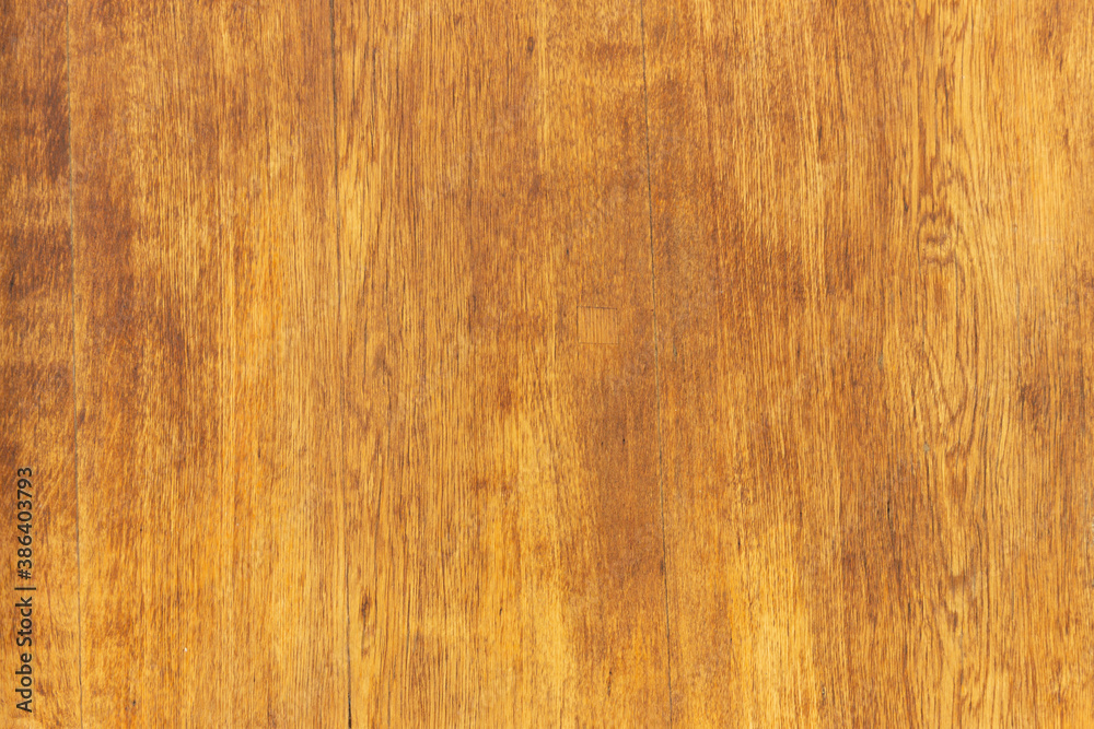 Texture of lacquered wood planks painted in brown. Texture of lacquered wood planks painted in brown.