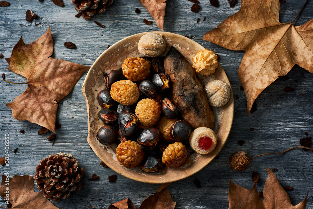 roasted sweet potato and chestnuts, and panellets - obrazy, fototapety, plakaty 