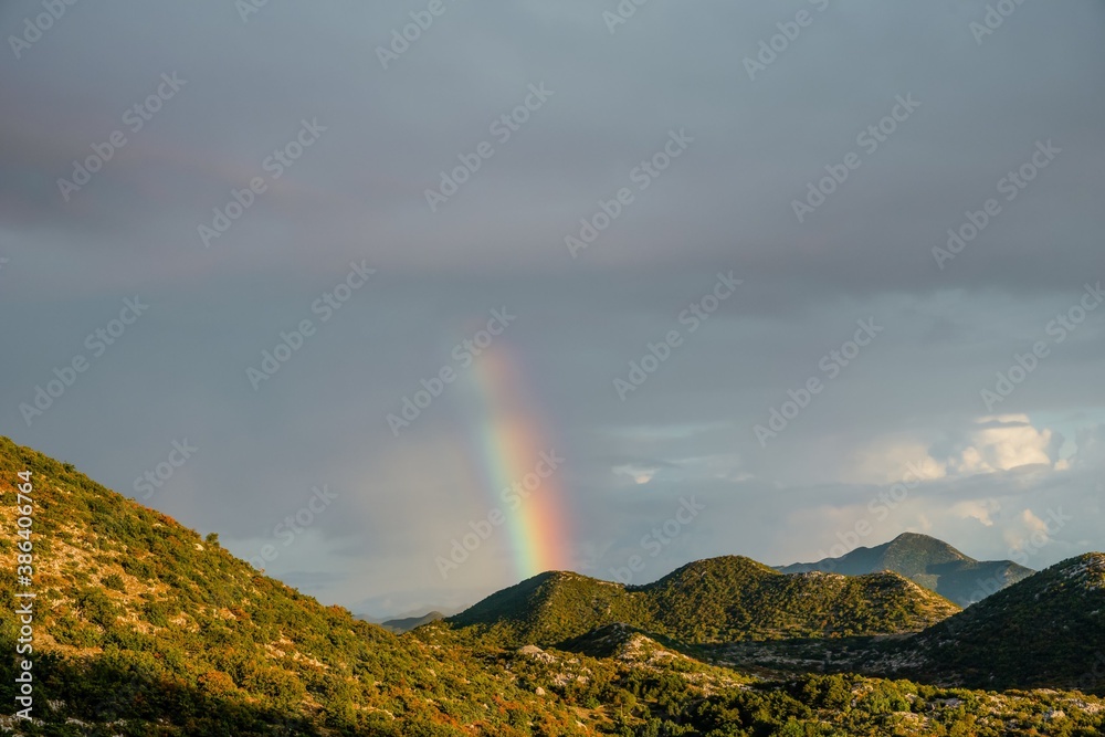 Rainbow landscape. Rainbow in the mountains, Biokovo, Croatia