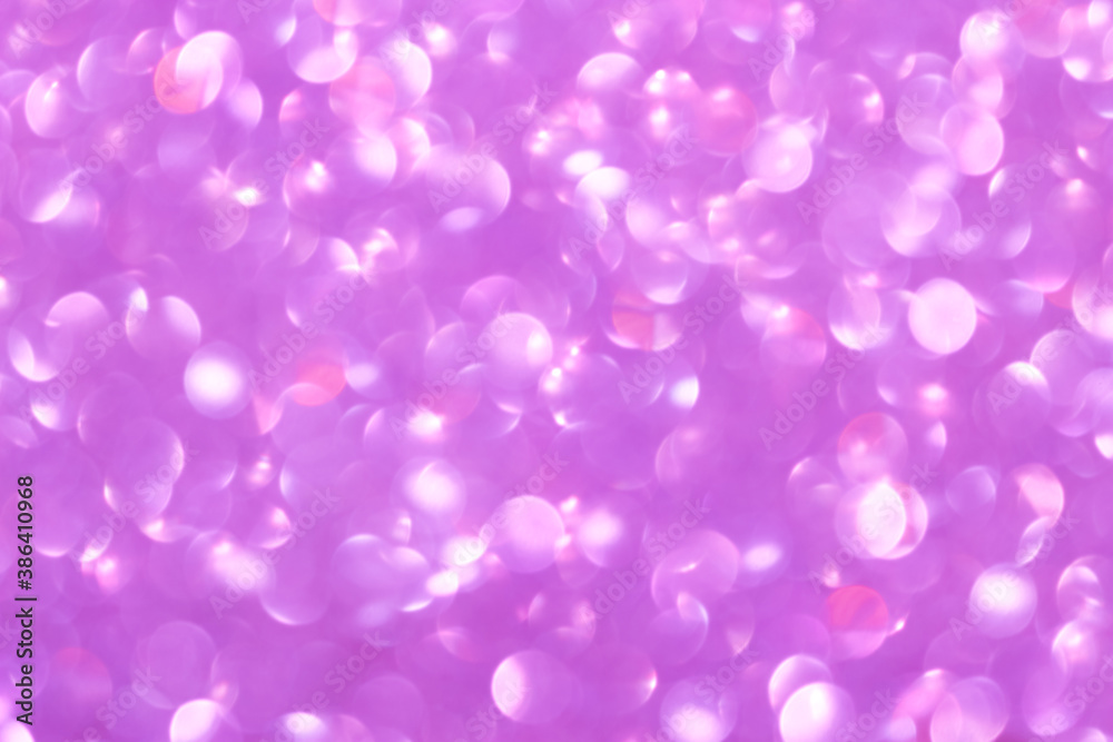An abstract pink background with sparkle lights and bokeh. Pink blurred light. An abstract pink background with sparkle lights and bokeh. Pink blurred light.