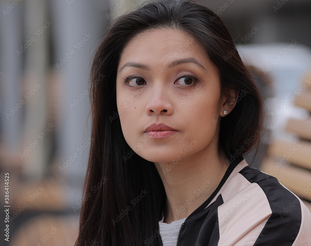 Pretty Asian girl in a city - close up shot - people photography Pretty Asian girl in a city - close up shot - people photography