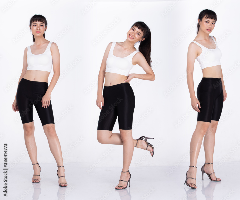 Asian Woman Full length pose stand wear suit high heel shoes Asian Woman Full length pose stand wear suit high heel shoes