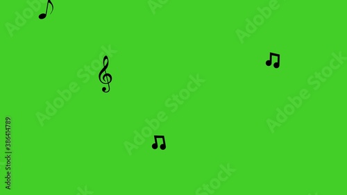 Musical note streaming up in melody. Green screen